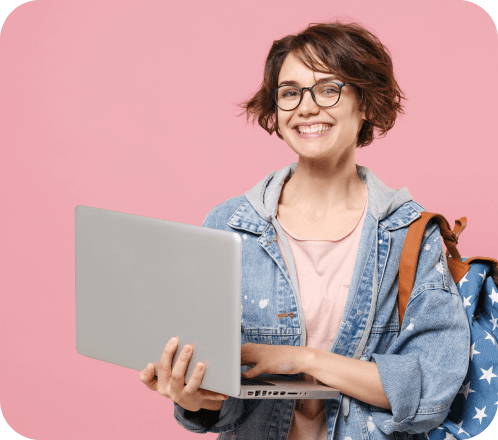Person with laptop on pink background